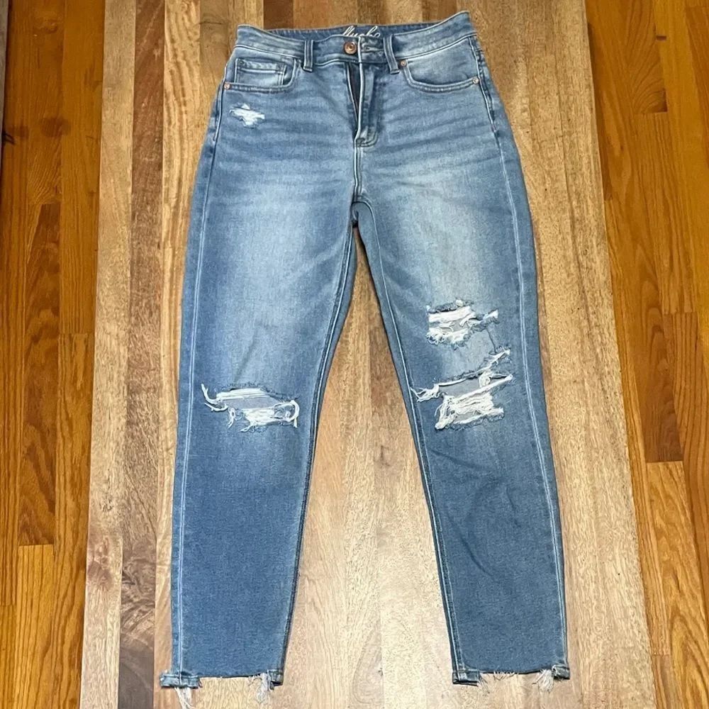 Distressed Blue Jeans